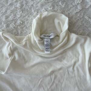 SPANX Suit Your Fancy Cream Turtleneck Long Sleeve Top